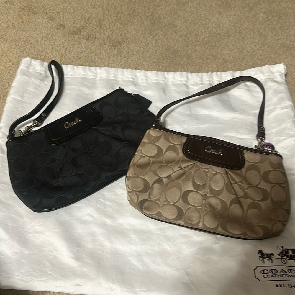 Coach black and tan wristlets
